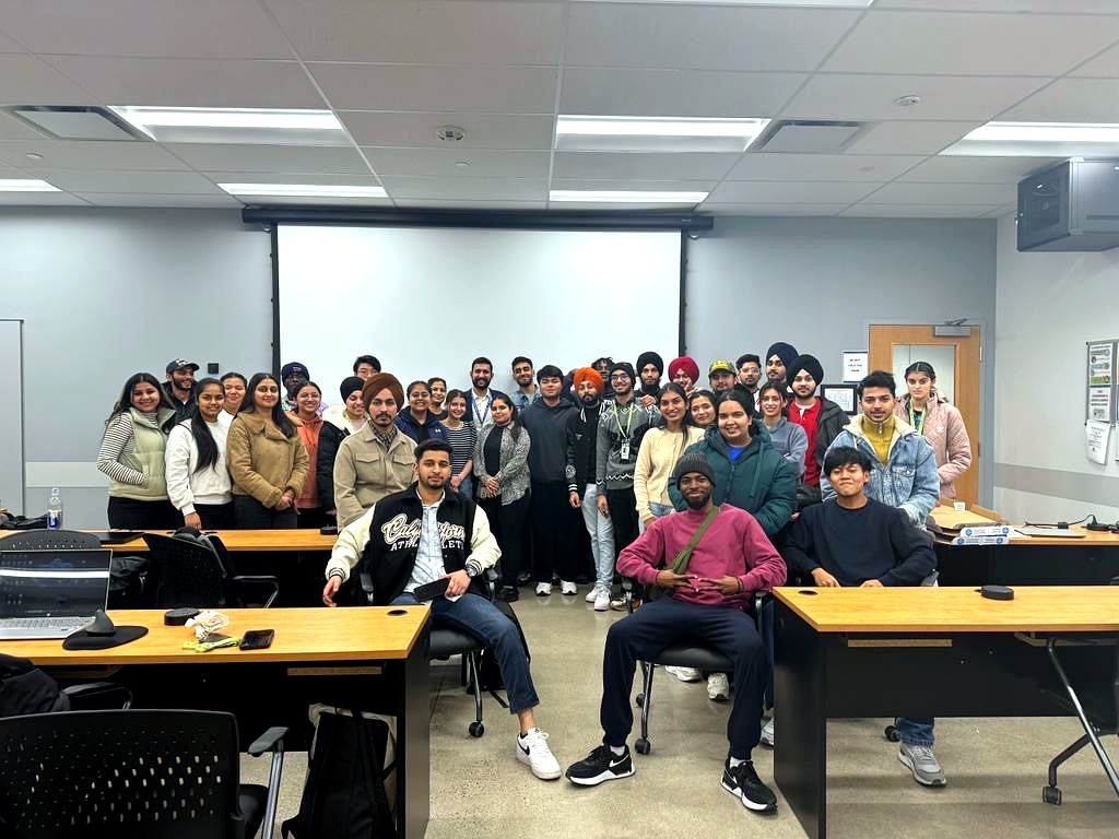 Sahil Sharma with a group of ScholarDigit learners after a training session